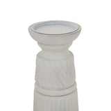 Elegant white candle holder with intricate detailing for stylish home decor and ambiance