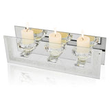 Elegant candle holder with three round spaces for tealights on a mirrored base for a stylish home decor