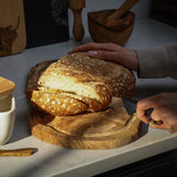 Selbrae House Carving Board made from natural wood, ideal for slicing bread and food preparation