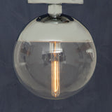 Orsina Ceiling Light with a transparent spherical design and vintage bulb for modern interiors