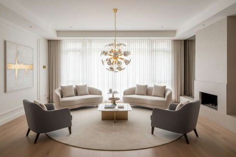Orsina Ceiling Light hanging over a modern lounge with soft grey sofas and a round coffee table