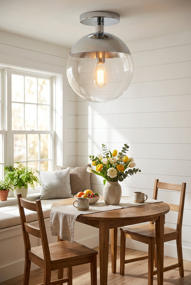 Orsina Ceiling Light featuring a modern design with a clear glass shade for dining areas