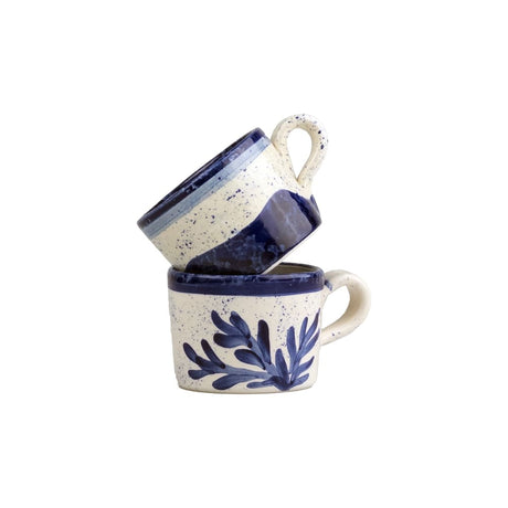 Selbrae House Ceramic Espresso Cups stacked with a floral design and navy accents