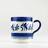 Hand-painted Selbrae House ceramic mug with blue floral design and striped pattern