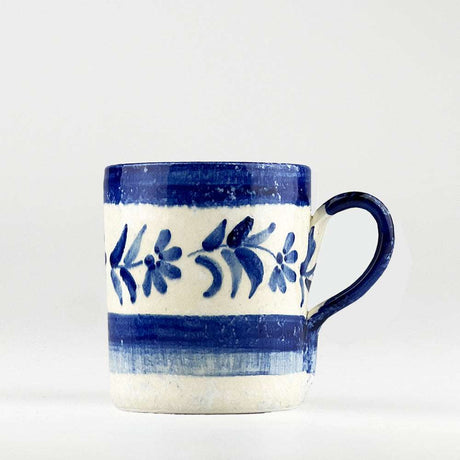 Hand-painted Selbrae House ceramic mug with blue floral design and striped pattern