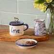 Selbrae House Ceramic Mug with Love Inscription, Accompanied by a Creamer and Plate on a Wooden Board