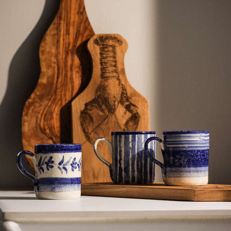Set of Selbrae House Ceramic Mugs in Blue and White Patterns on a Wooden Tray