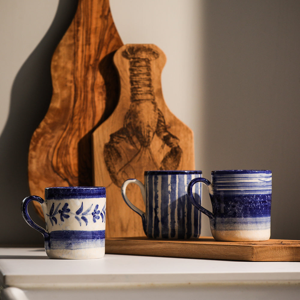 Set of Selbrae House Ceramic Mugs in Blue and White Patterns on a Wooden Tray