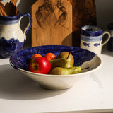 Selbrae House Serving Bowl in Blue and Cream with Fresh Apples and Pears Displayed