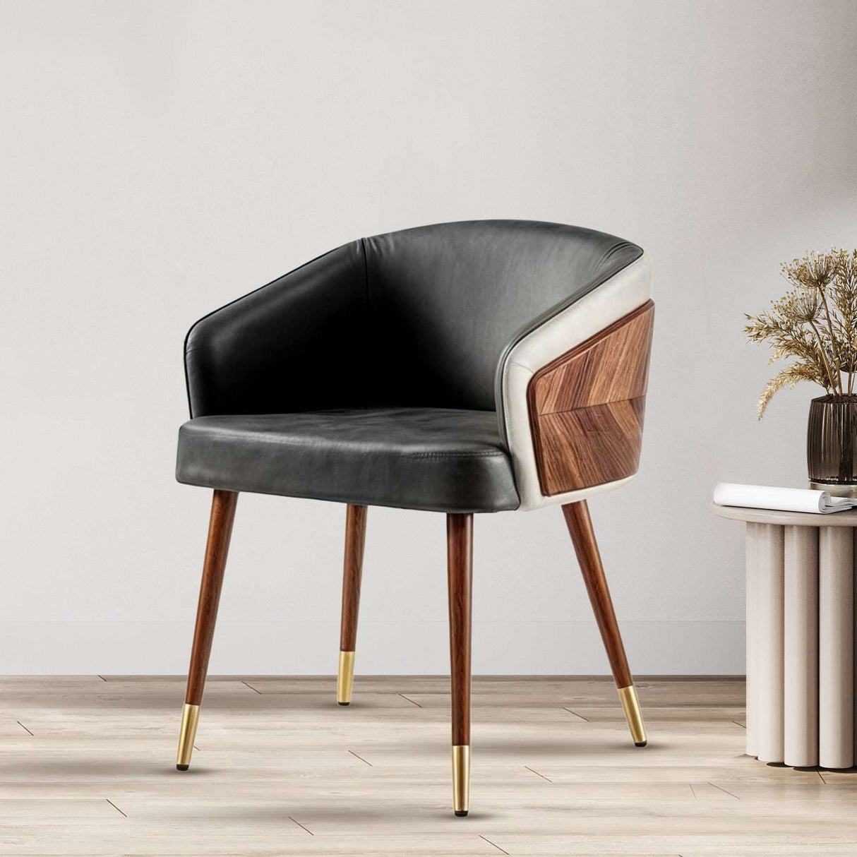 Stylish Nisu Home chair with a curved black leather seat and wooden accents for modern decor
