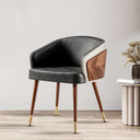 Stylish Nisu Home chair with a curved black leather seat and wooden accents for modern decor