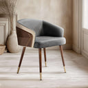 Elegant Nisu Home chair featuring a grey upholstered seat and wooden legs with gold accents
