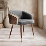 Elegant Nisu Home chair featuring a grey upholstered seat and wooden legs with gold accents