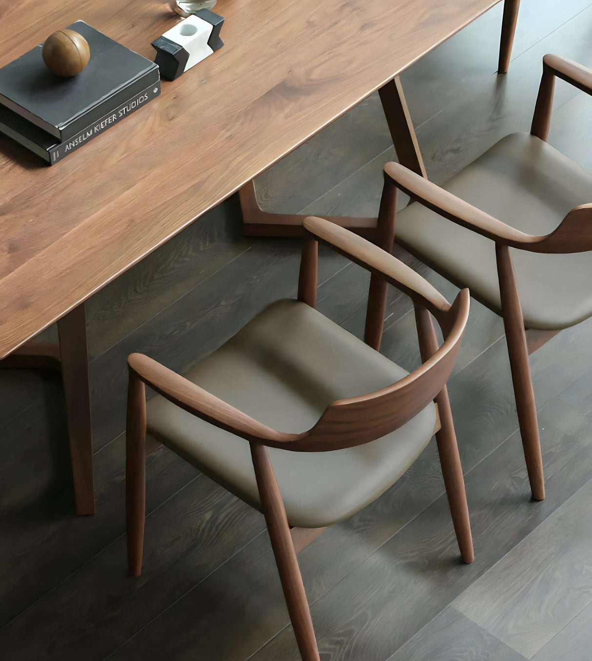 Stylish Nisu Home Chair with Wood Finish and Brown Upholstery at a Modern Dining Table