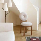 Modern Nisu Home chair with soft upholstery and round backrest in a stylish interior setting