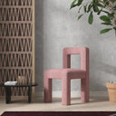 Modern Nisu Home Chair in pink fabric with a unique geometric design for contemporary interiors