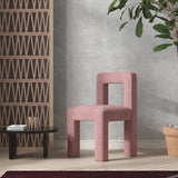 Modern Nisu Home Chair in pink fabric with a unique geometric design for contemporary interiors