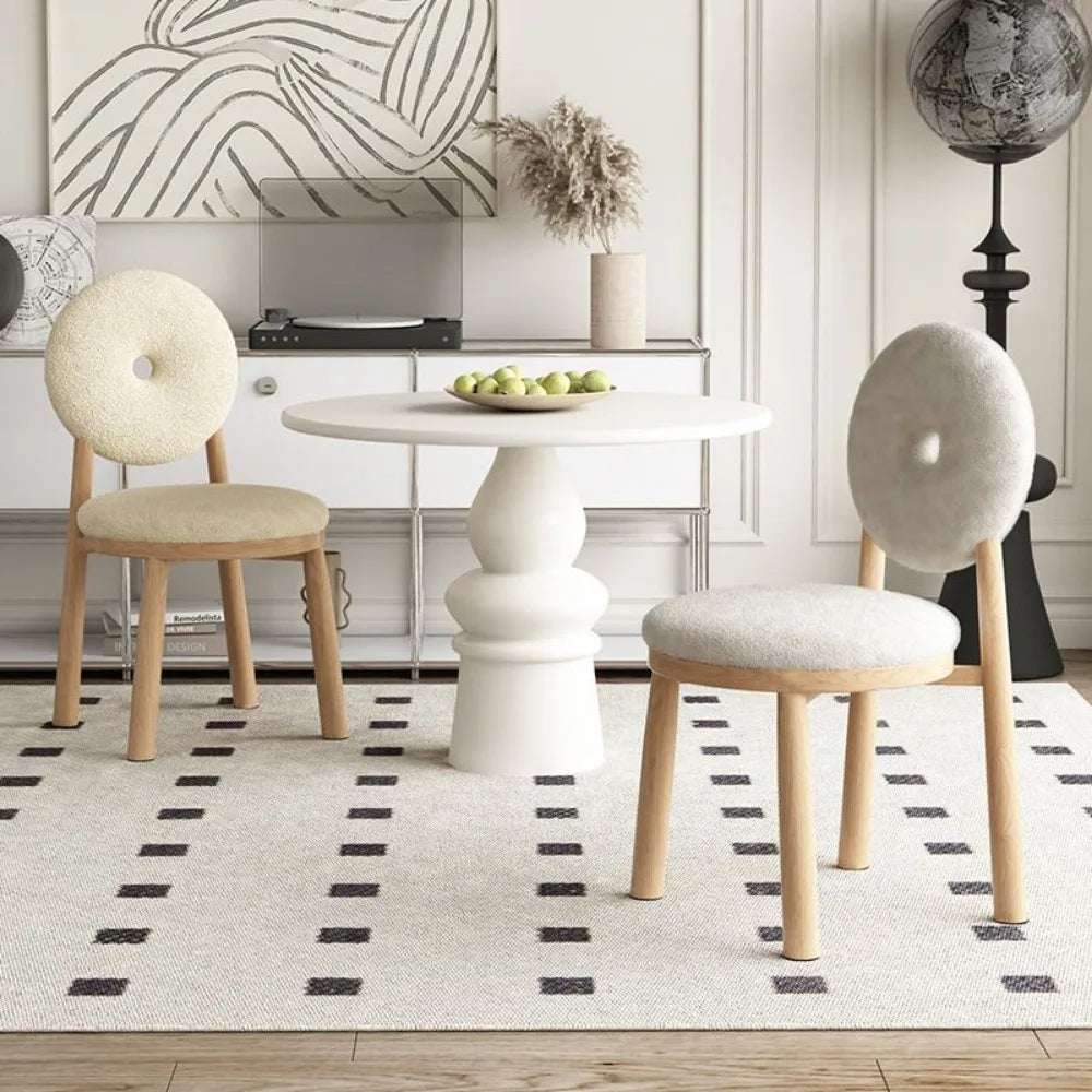 Nisu Home modern chair set featuring unique round designs and wooden legs for stylish dining spaces