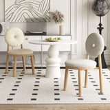 Nisu Home modern chair set featuring unique round designs and wooden legs for stylish dining spaces