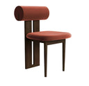 Stylish Nisu Home Chair with a unique cylindrical back and rich red upholstery
