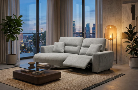 Modern grey Chaise Lounge with reclining feature and stylish design in a contemporary living room