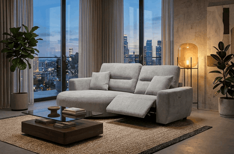Modern grey Chaise Lounge with reclining feature and stylish design in a contemporary living room