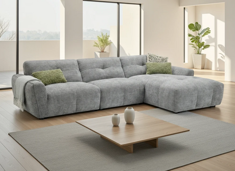 Stylish grey corner sofa with a chaise lounge, perfect for modern living spaces
