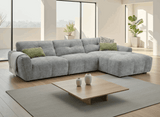 Stylish grey corner sofa with a chaise lounge, perfect for modern living spaces