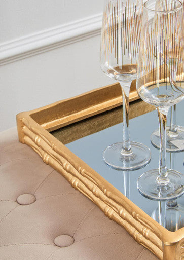 Elegant Orsina Champagne Glasses on a mirrored tray for stylish entertaining