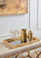 Elegant Orsina Champagne Glasses displayed on a gold tray with a cocktail shaker and ice bucket