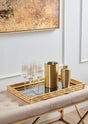 Elegant Orsina Champagne Glasses displayed on a gold tray with a cocktail shaker and ice bucket