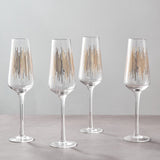 Set of four elegant Orsina Champagne Glasses with modern gold geometric patterns for celebrations