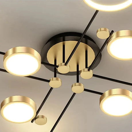 Modern chandelier by Light My House with gold accents and circular LED lights for stylish illumination