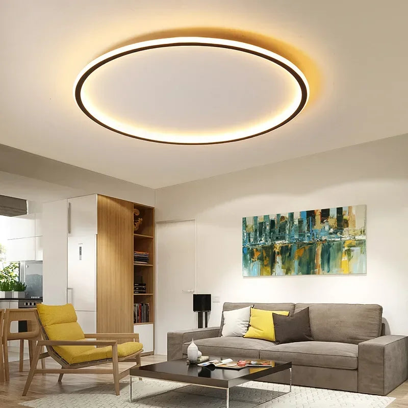 Modern LED chandelier in a stylish living room with warm lighting and minimalist furniture