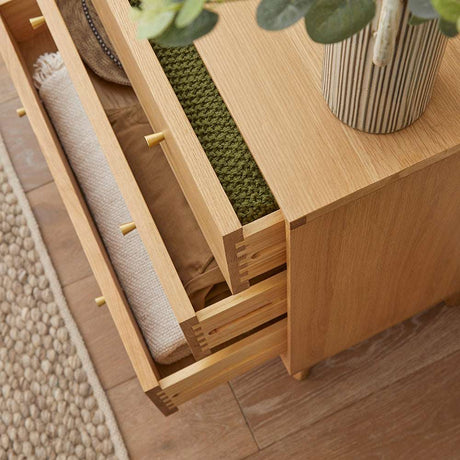 Fishe and Lilly Chest of 3 Drawers in natural wood finish showcasing open drawers with neatly folded linens
