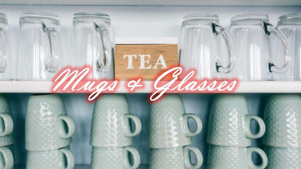 China Mugs Set displayed on a shelf alongside glassware with a tea sign