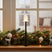 Elegant Christmas window decoration featuring a glowing tree and reindeer, with a Magic Wand accent