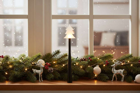 Elegant Christmas window decoration featuring a glowing tree and reindeer, with a Magic Wand accent