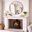 Jobu Home Circle Mirror above a fireplace in a stylish living room setting