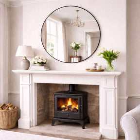 Jobu Home Circle Mirror above a fireplace in a stylish living room setting