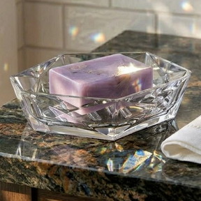 Orsina Crystal Soap Dish showcasing a lavender soap bar on a decorative marble countertop
