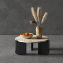 Stylish Nisu Home Coffee Table with a round marble top and black wooden legs, perfect for modern interiors