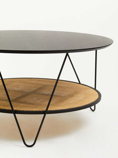 Orsina Coffee Table with a sleek black top and woven rattan shelf for stylish living rooms