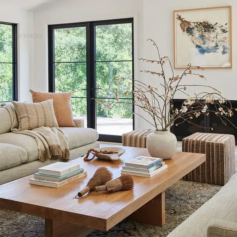Contemporary Nisu Home Coffee Table in a stylish living room setting with decorative accents