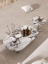 Nisu Home Coffee Table with a stylish marble design and sleek metal legs for modern living spaces