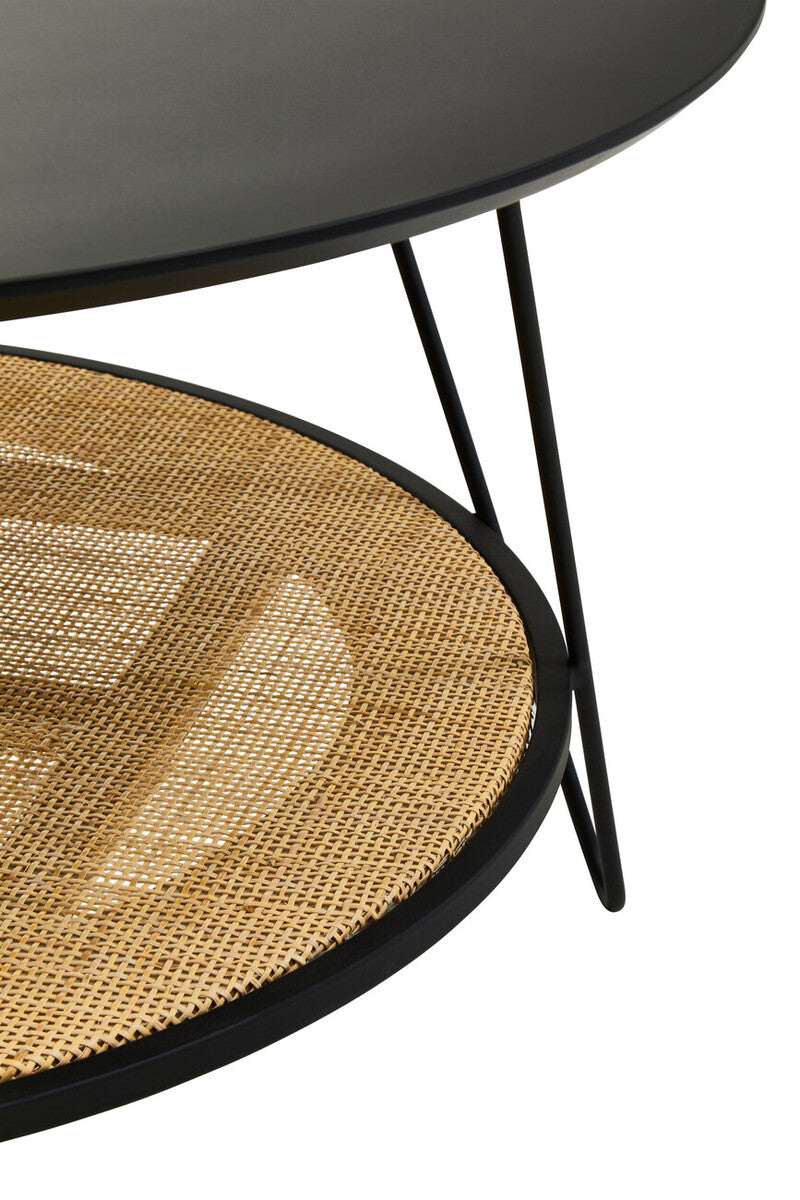 Orsina Coffee Table with a sleek black round top and a woven rattan base for a modern living room