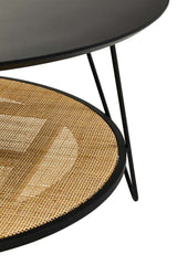 Orsina Coffee Table with a sleek black round top and a woven rattan base for a modern living room