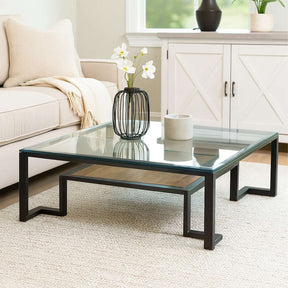 Orsina Coffee Table with a sleek glass top and modern metal legs, perfect for contemporary living rooms