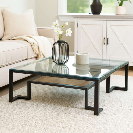 Orsina Coffee Table with a sleek glass top and modern metal legs, perfect for contemporary living rooms