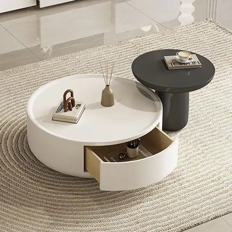 Modern minimalist Coffee Table in white with a drawer and a round black side table